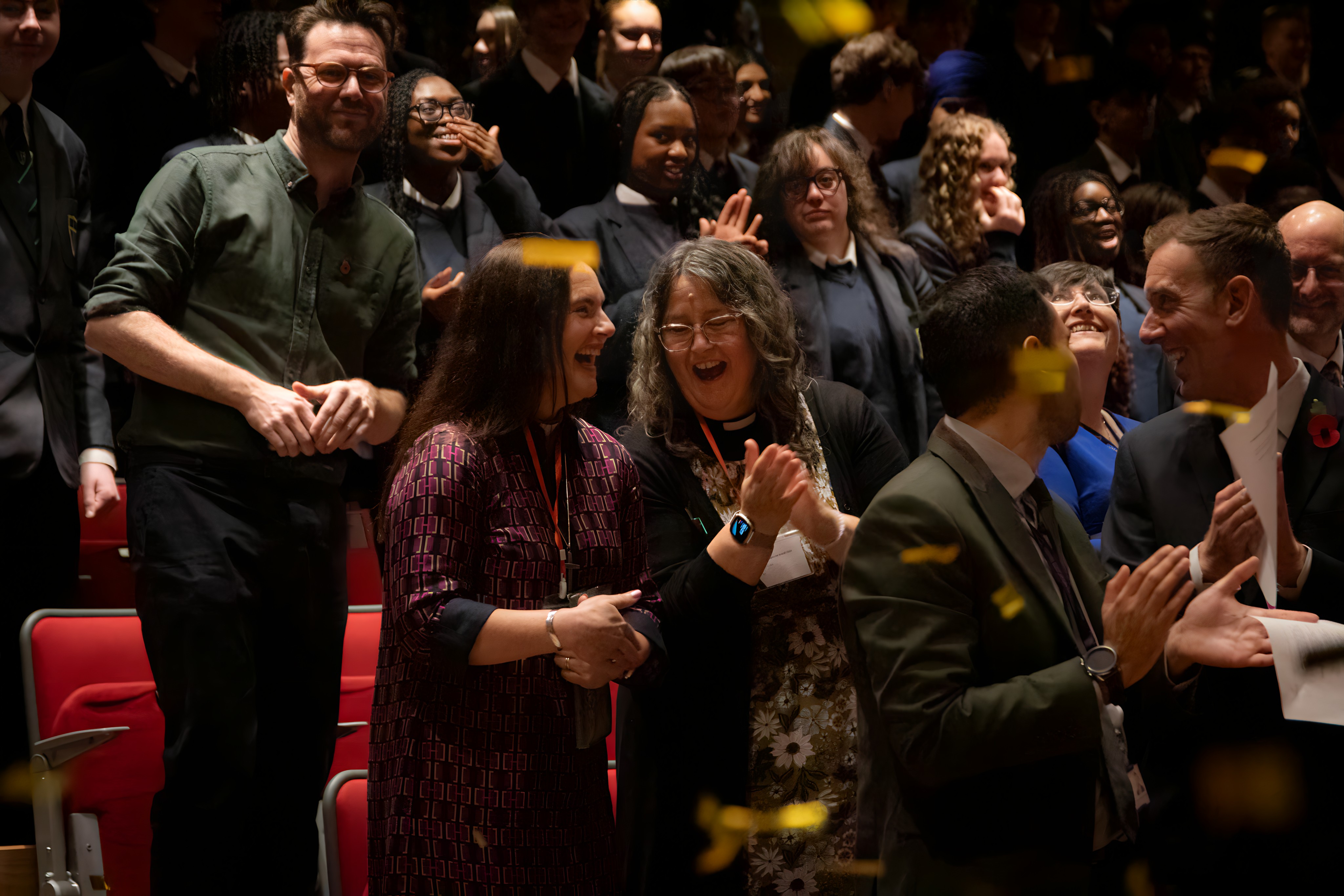 Bishop Sophie surrounded by confetti 